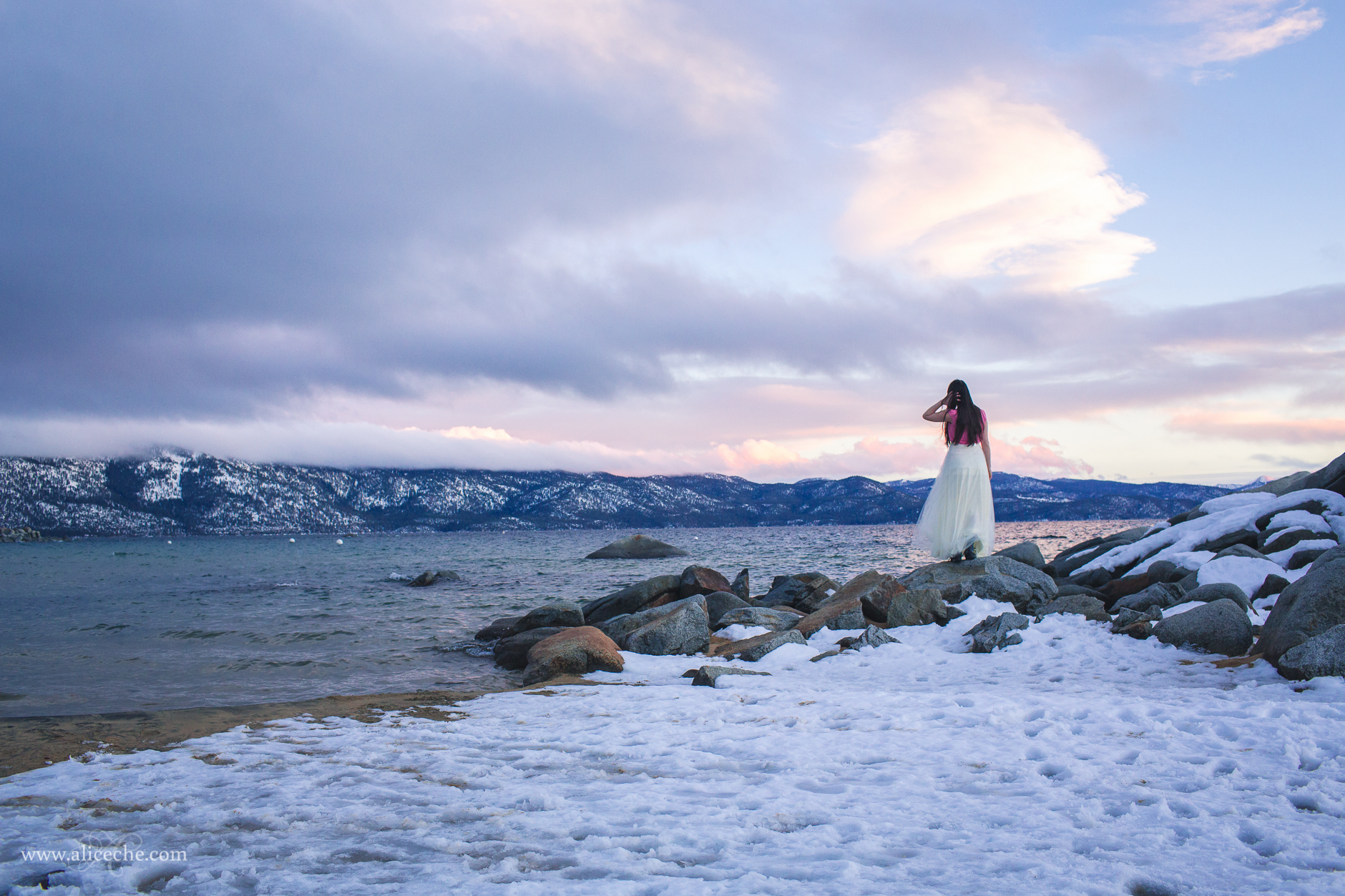alice-che-photography-lake-tahoe-self-portrait-sunset-girl-in-tulle-skirt-on-edge-of-lake-and-snow