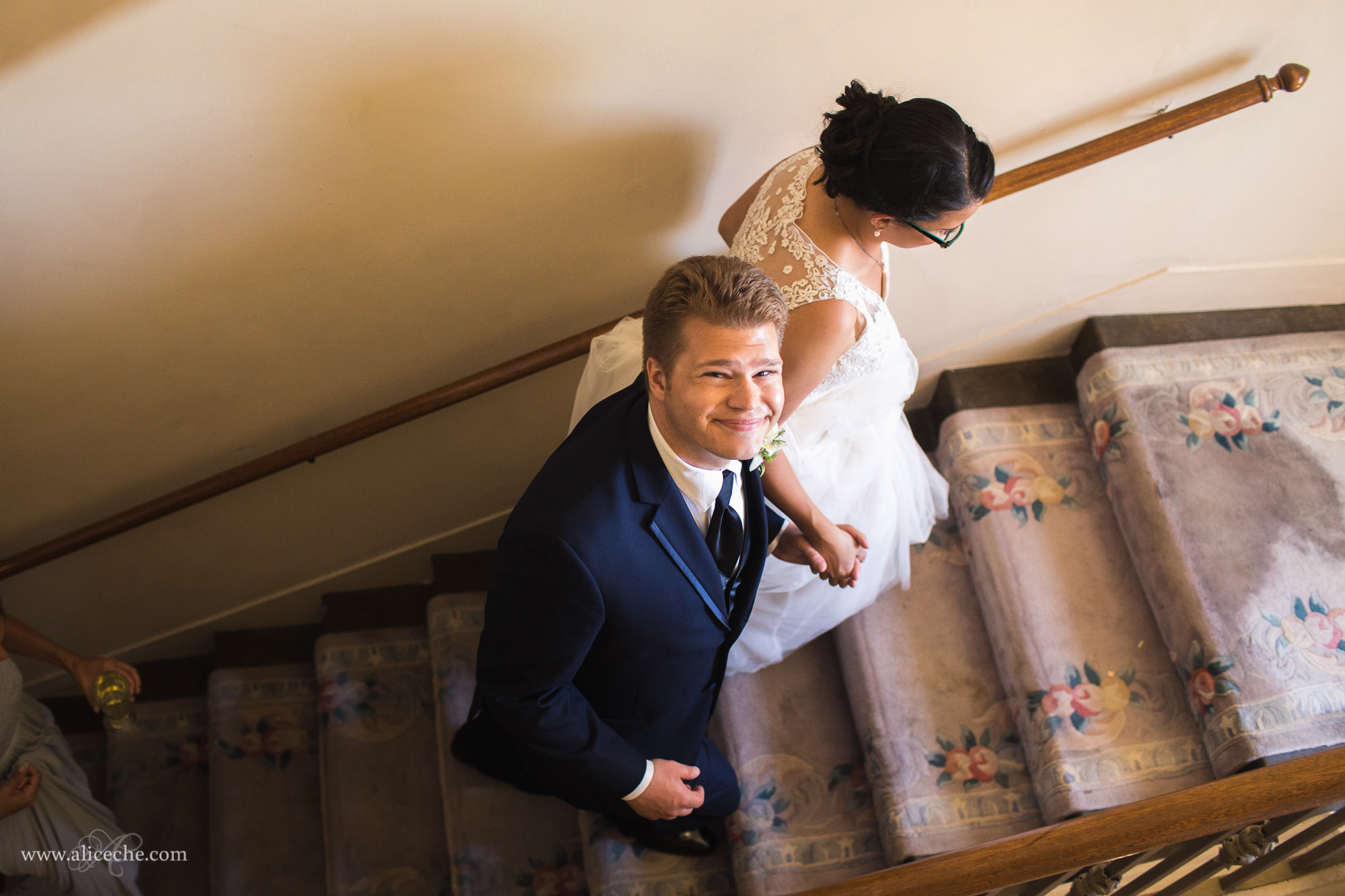 bellevue-club-oakland-wedding-photographer-bride-and-groom-walking-up-steps