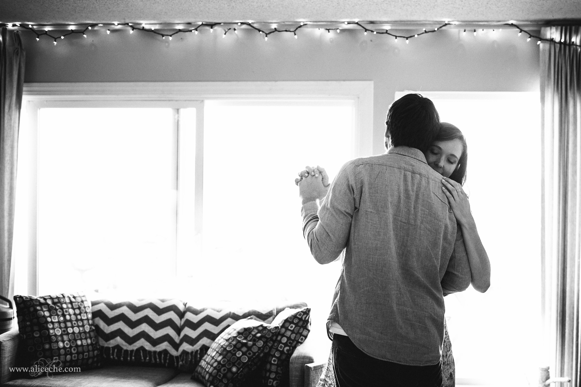 in-home San Carlos Engagement Session Twinkle Lights Black and White Backlit Dancing Couple San Francisco Bay Area Photographer