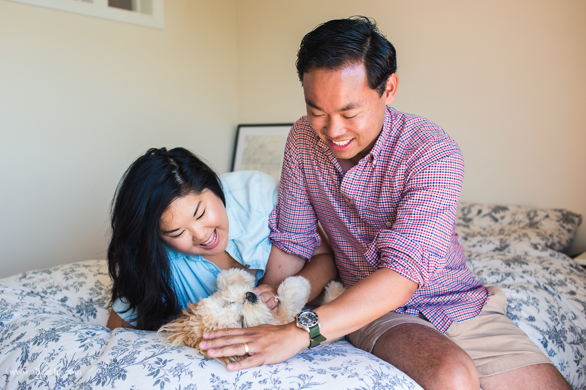 In-home Couples Session with Puppy on Bed