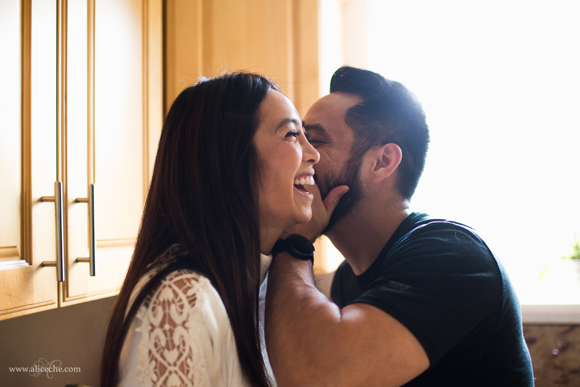 san francisco intimate at home engagement couple laughing in kitchen