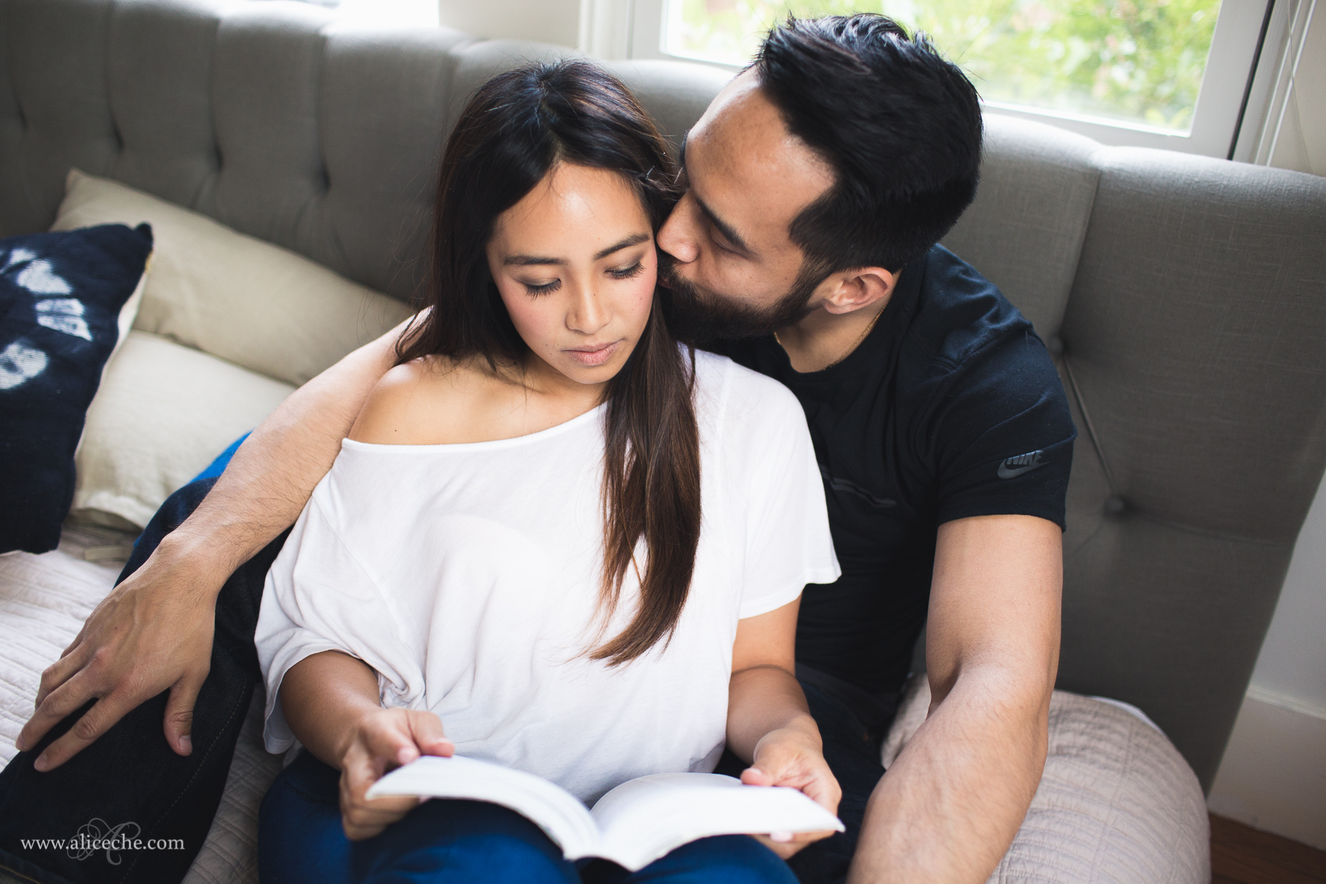 san francisco intimate at home engagement couple reading in bed