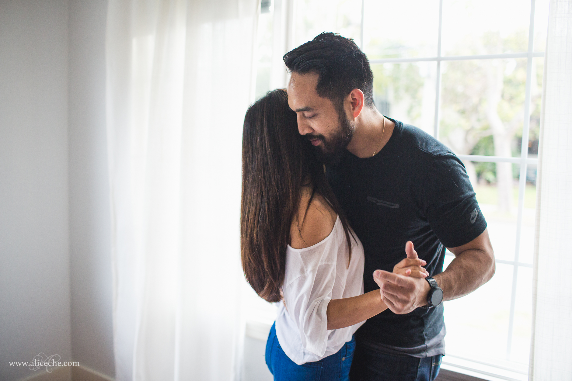 san francisco intimate at home engagement couple dancing in bedroom