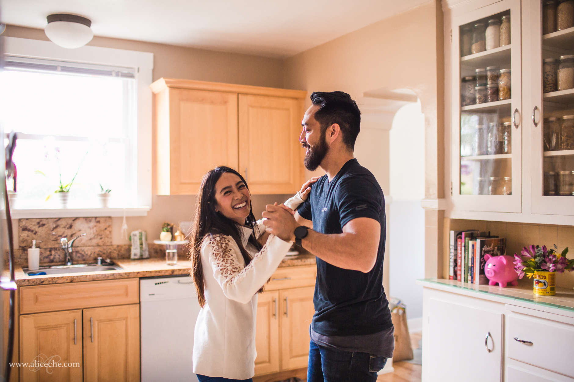 san francisco intimate at home engagement couple dancing in kitchen