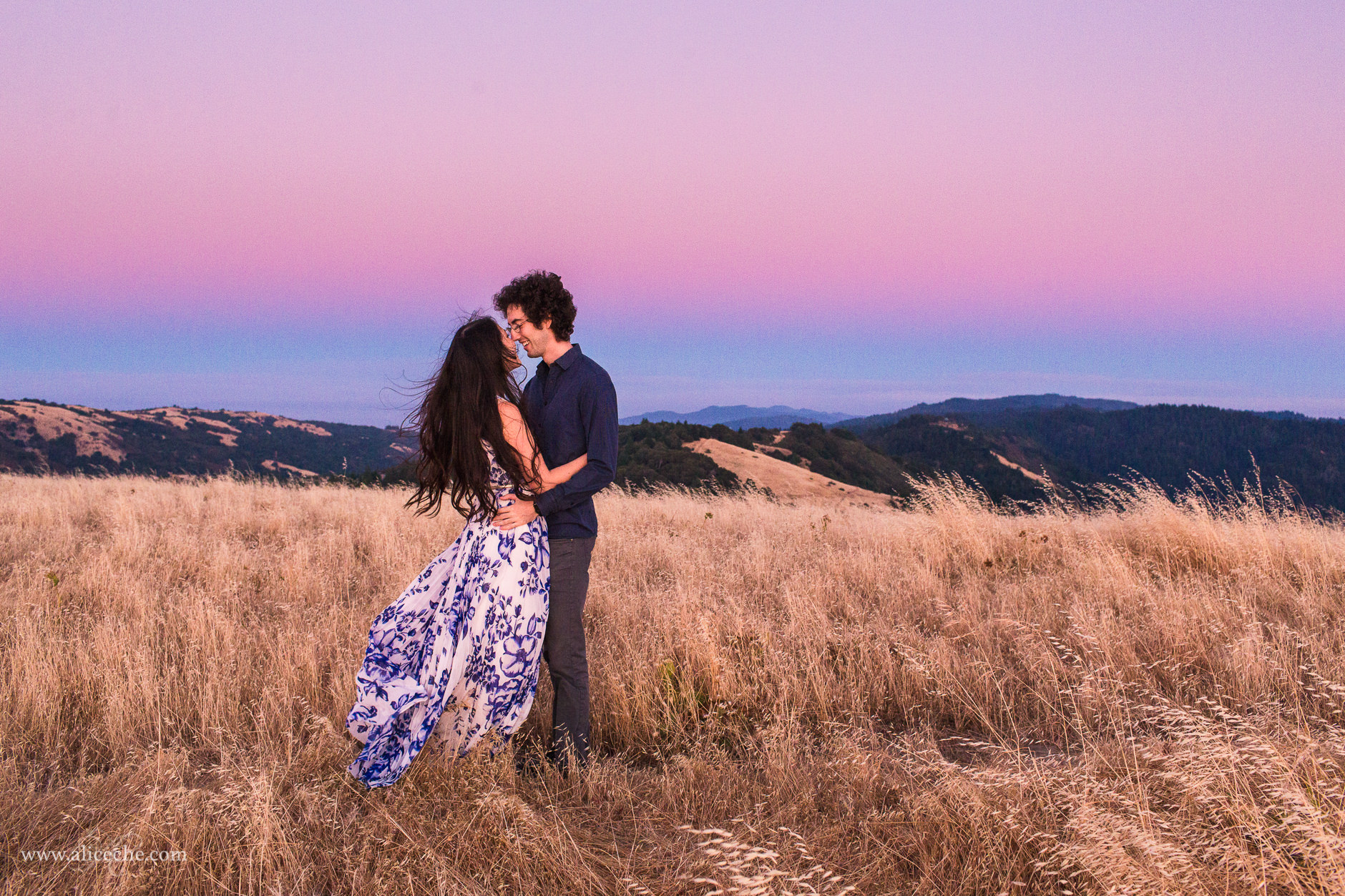 Russian Ridge Couples Session Couple at Dusk Windswept Hair and Dress