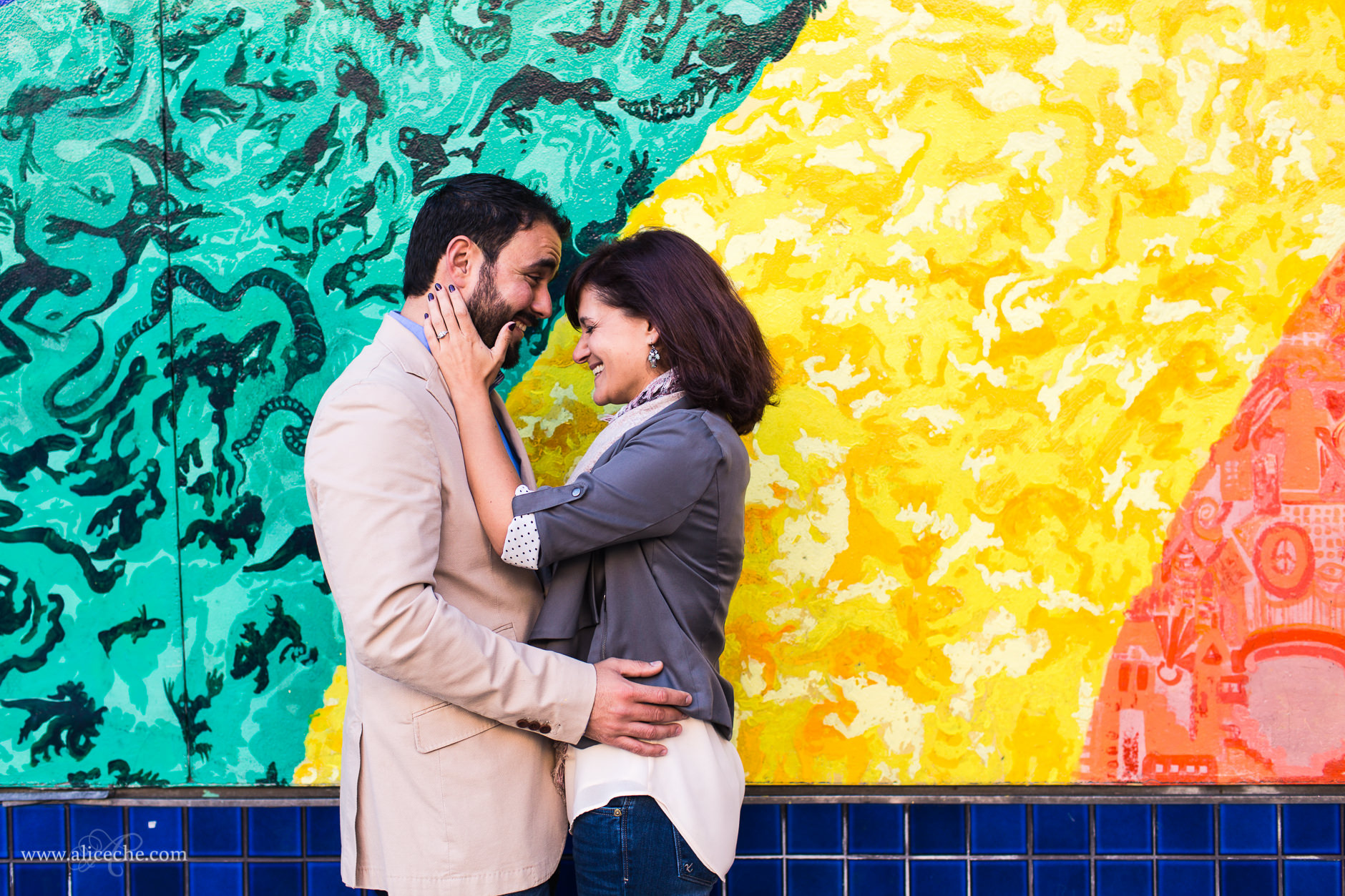 haight-ashbury-engagement-session-san-francisco-wedding-photographer-couple-in-front-of-rainbow-mural