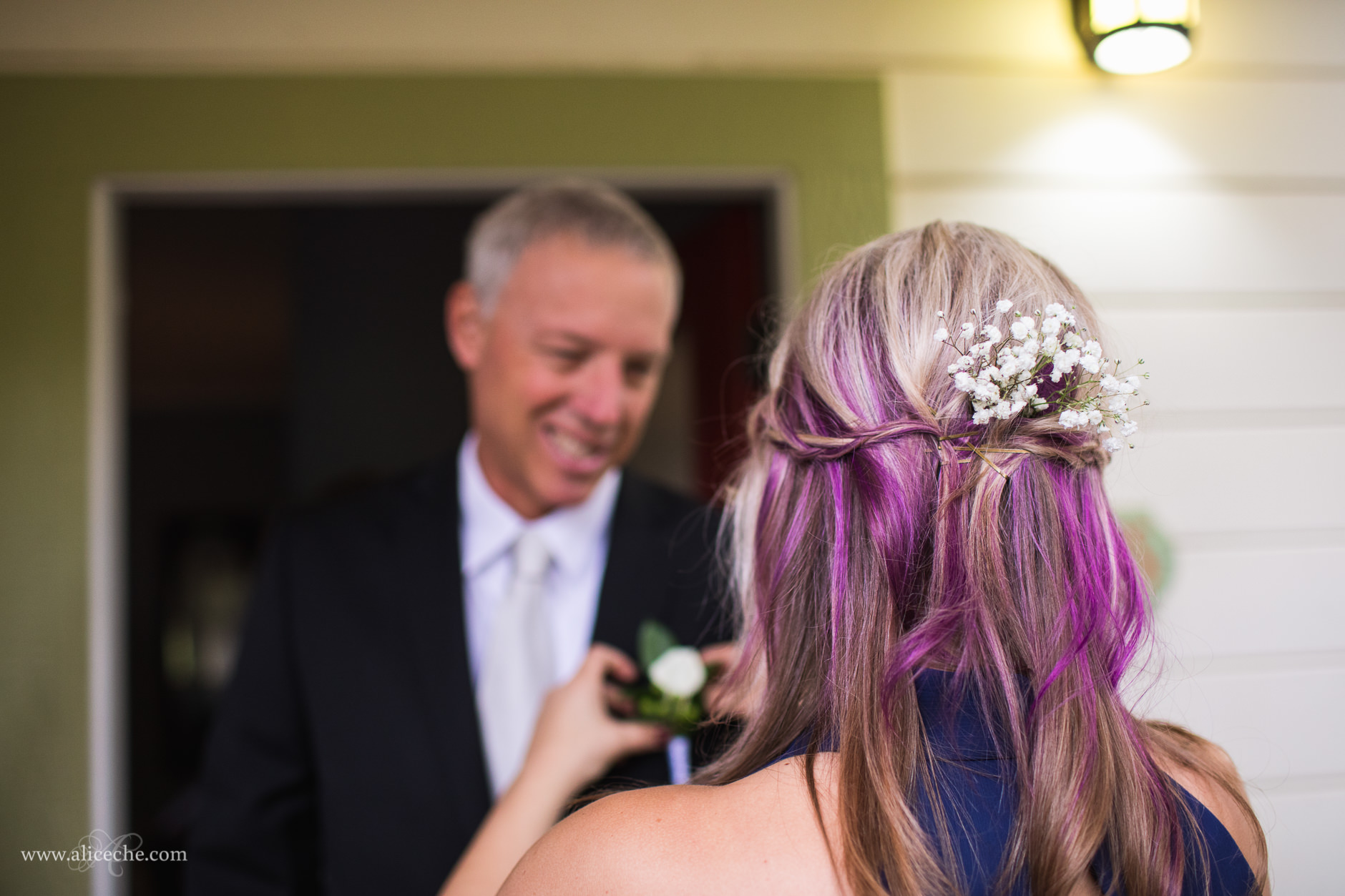 Loomis Flower Farm Wedding Bridesmaid pinning boutenniere on father
