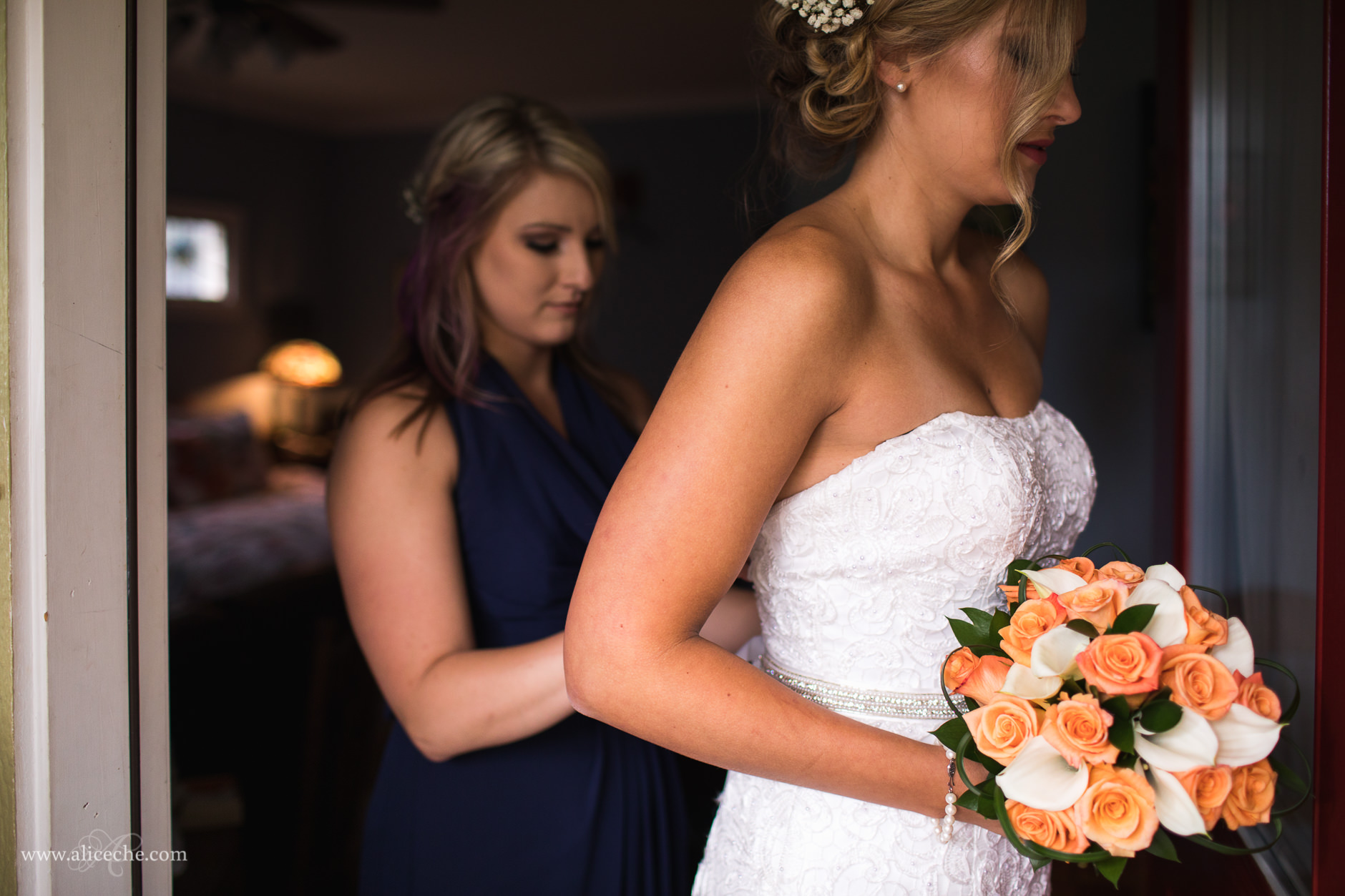 Loomis Flower Farm Wedding Bridesmaid helping Bride with Dress
