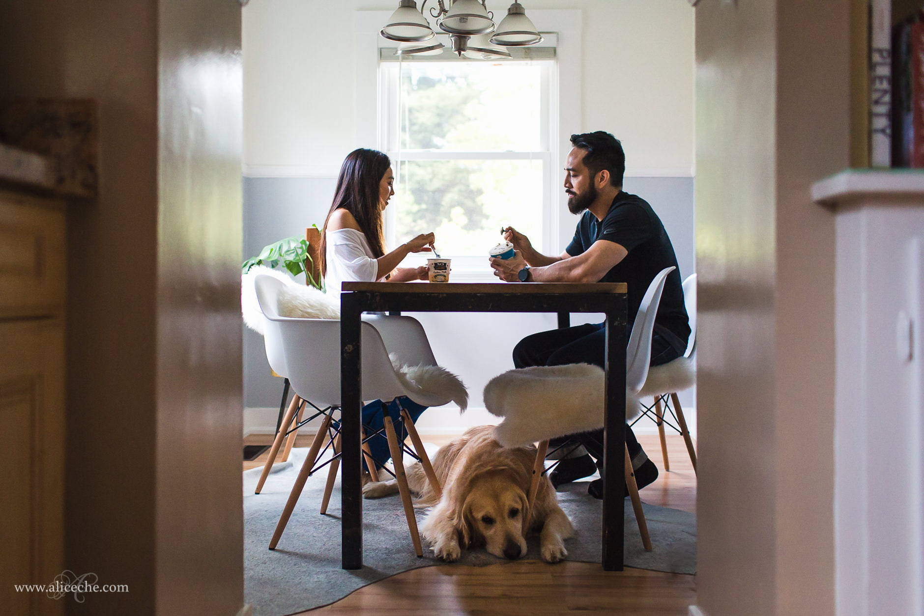San Carlos In Home Engagement Session Couple Eating Ice Cream in Dining Nook with Golden Retriever