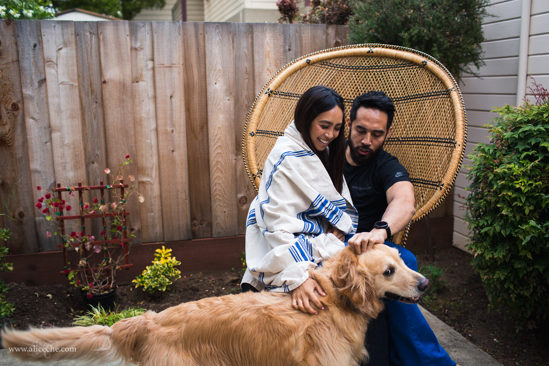 San Carlos In Home Engagement Session Couple Petting Golden Retriever