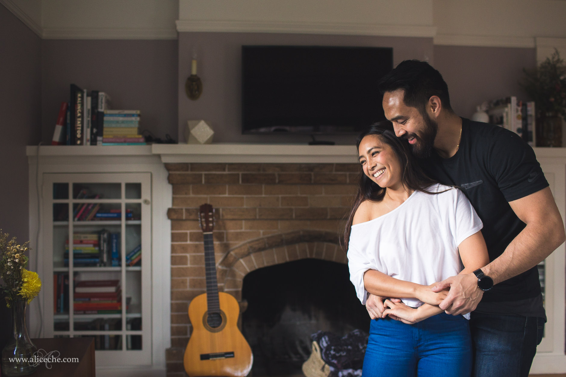San Carlos In Home Engagement Session Laughing Couple Dancing in Living Room