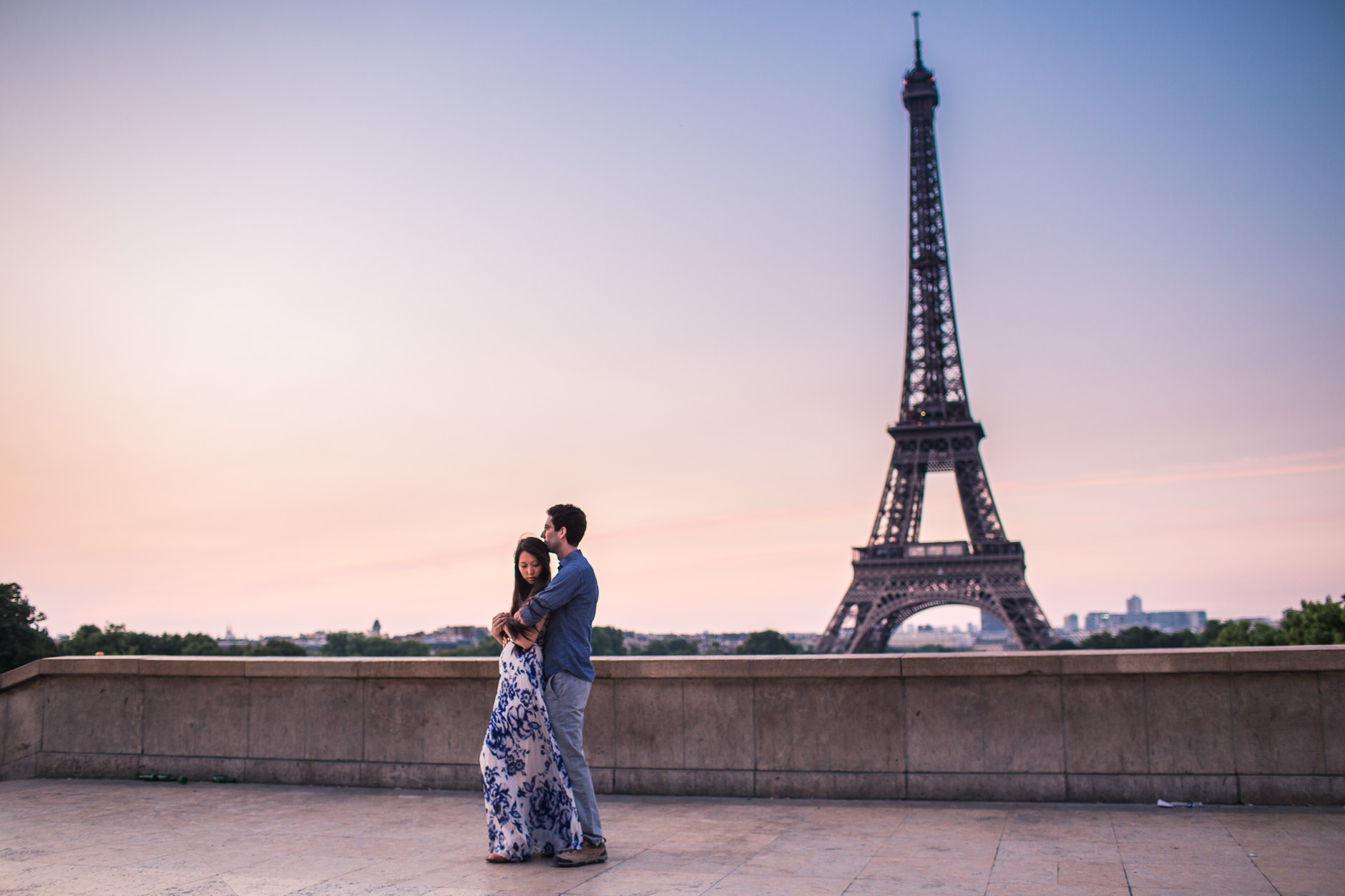 Sunrise in Paris at Trocadero Couple Hugging in front of Eiffel Tower Destination Wedding Photographer