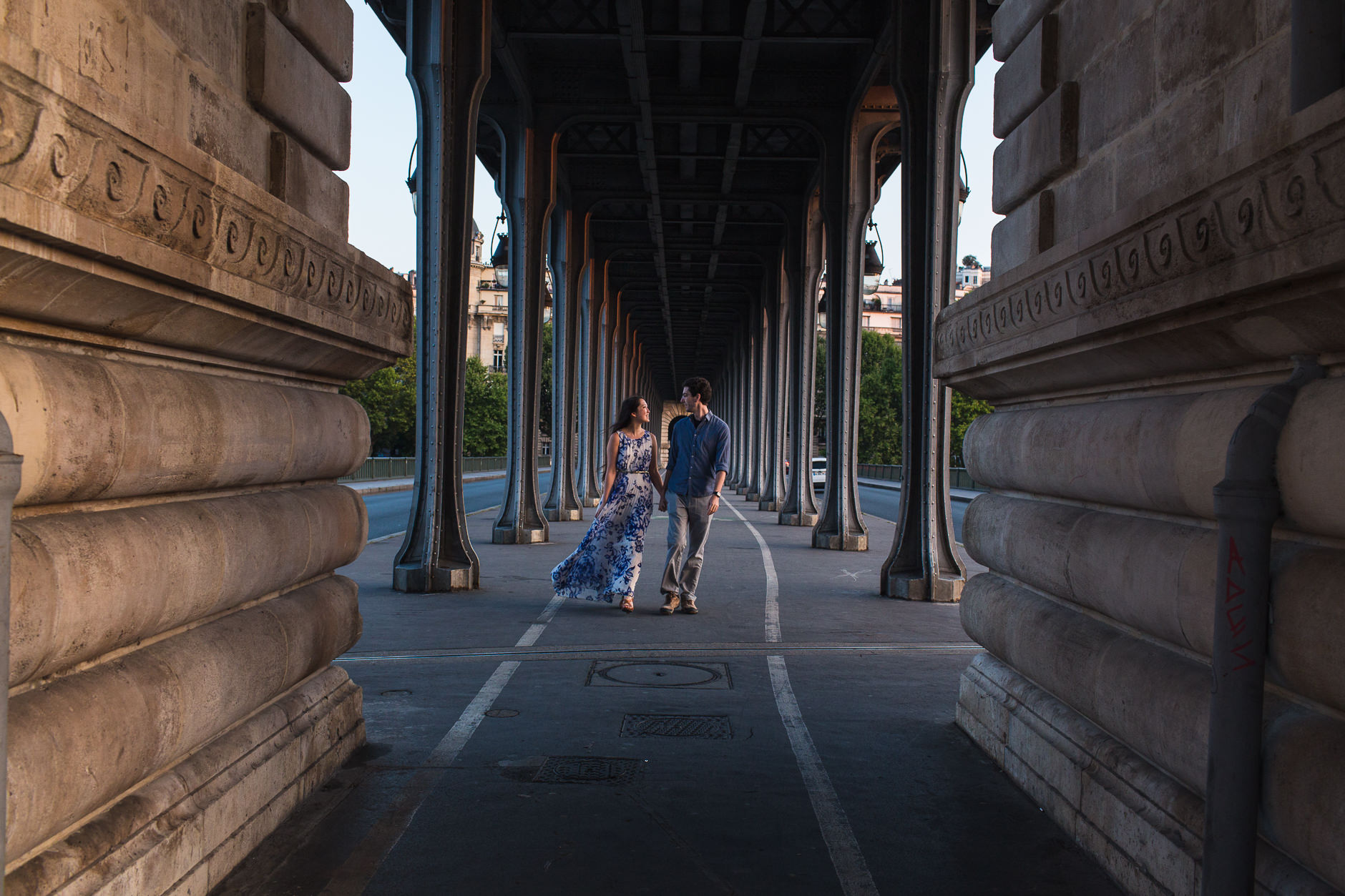 Sunrise in Paris under Pont du bir-Hakeim Couples Walking Destination Wedding Photographer