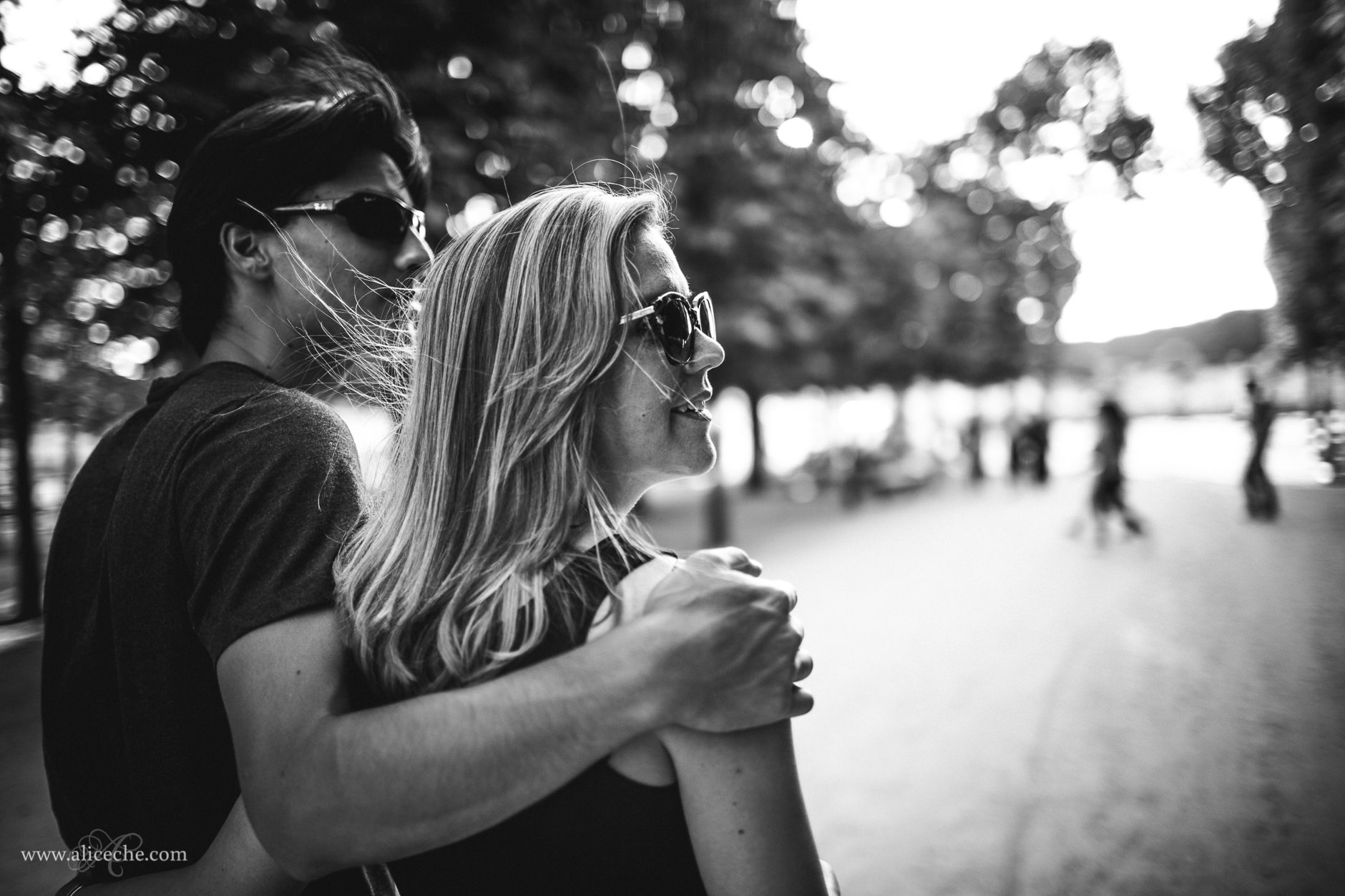 Paris Engagement Session Black and White Photo of Couple Walking along Jardin Tulleries