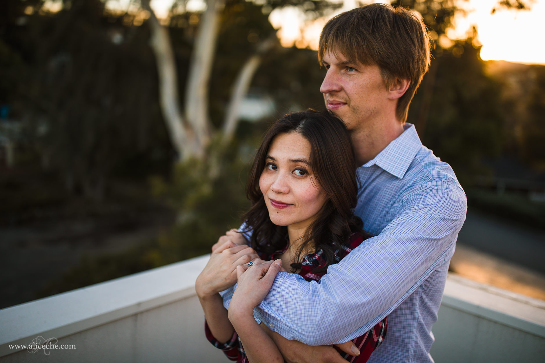 Redwood City In Home Engagement Session Guy hugging girl from behind