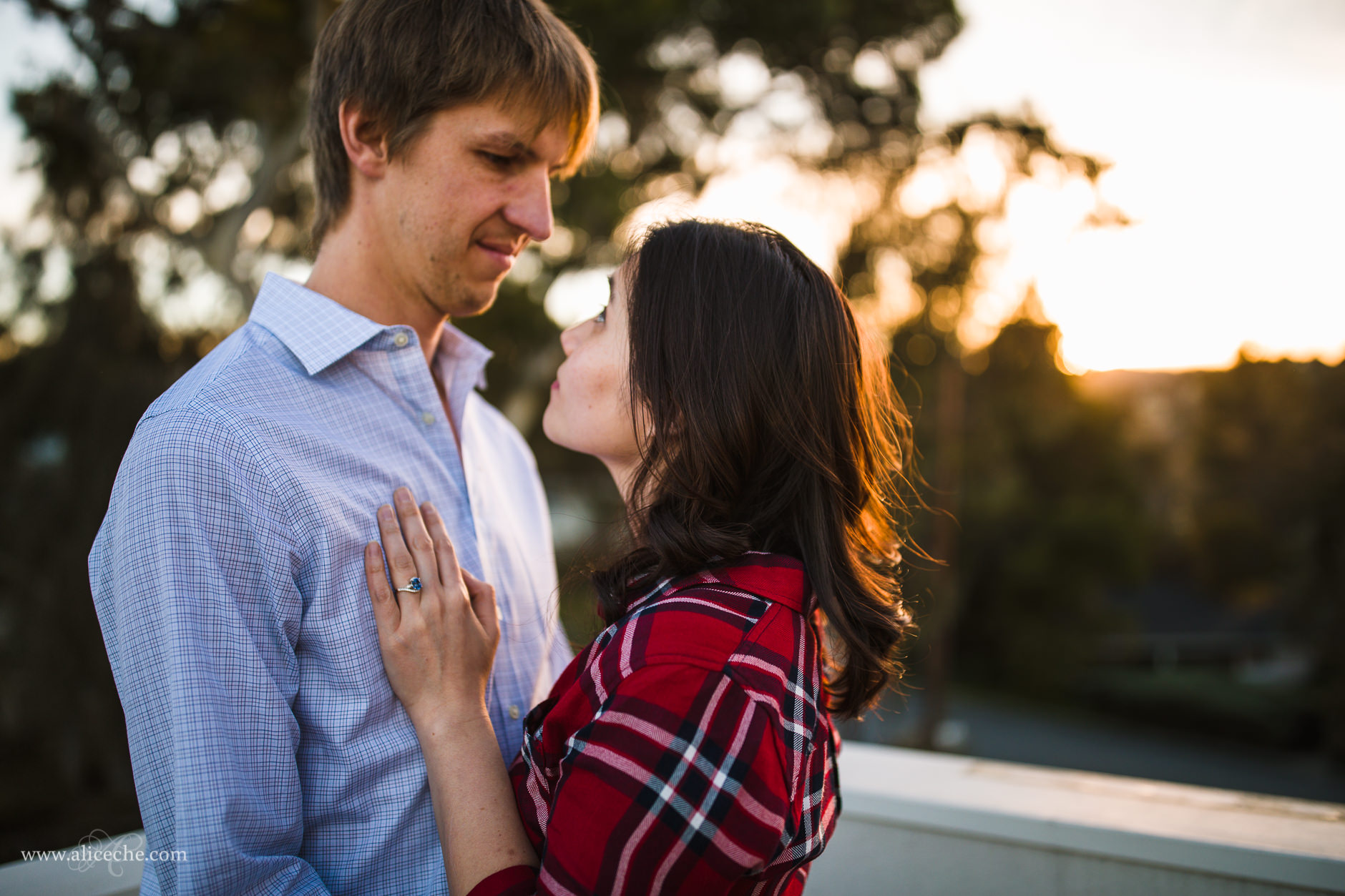 Redwood City In Home Engagement Session Girl with Hand on Fiance's Chest