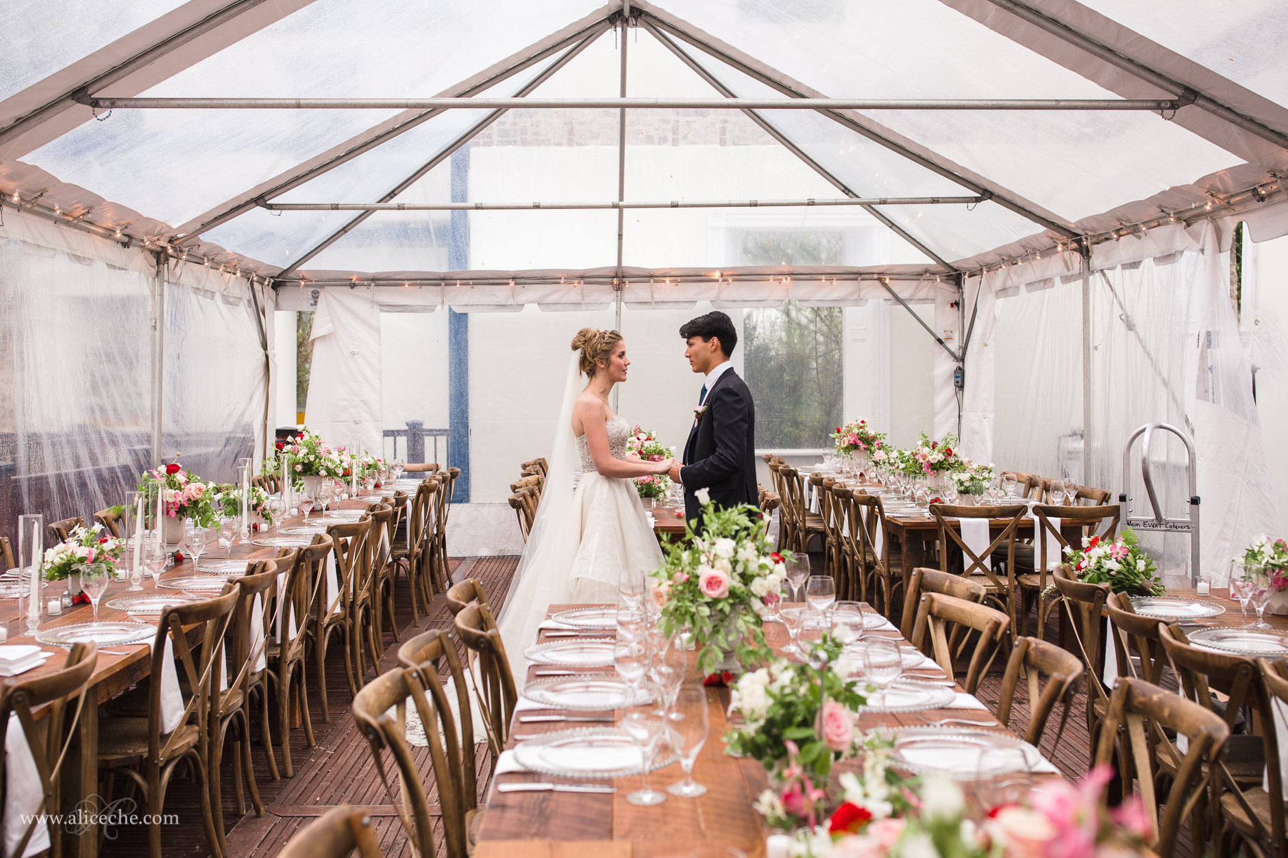 Tented Wedding Reception with gorgeous florals at Patapsco Female Institute