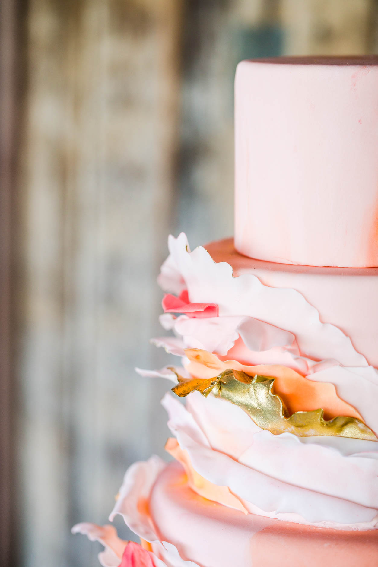 Georgia O'Keefe Inspired Cake with pink, orange and gold ruffles