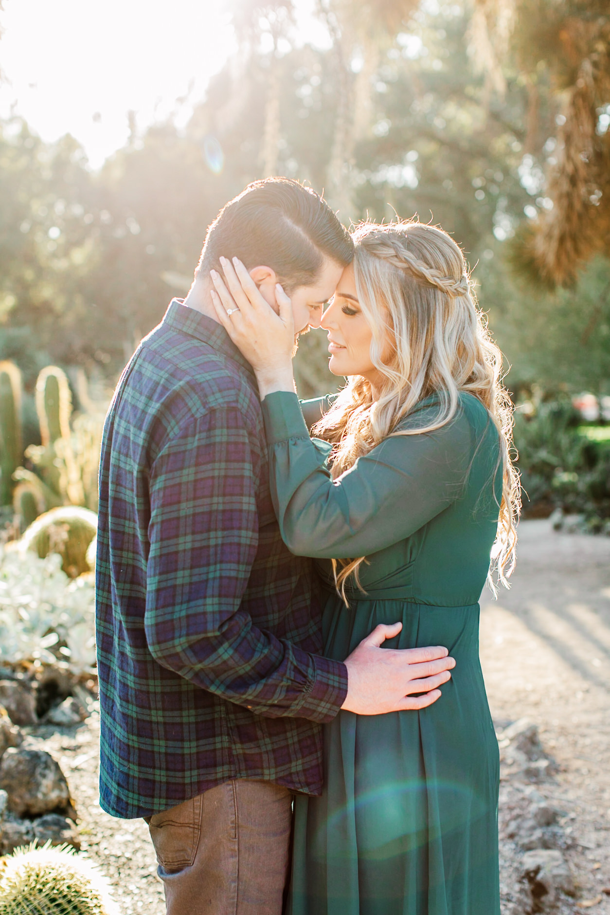 Engaged couple in dreamy light at the cactus garden