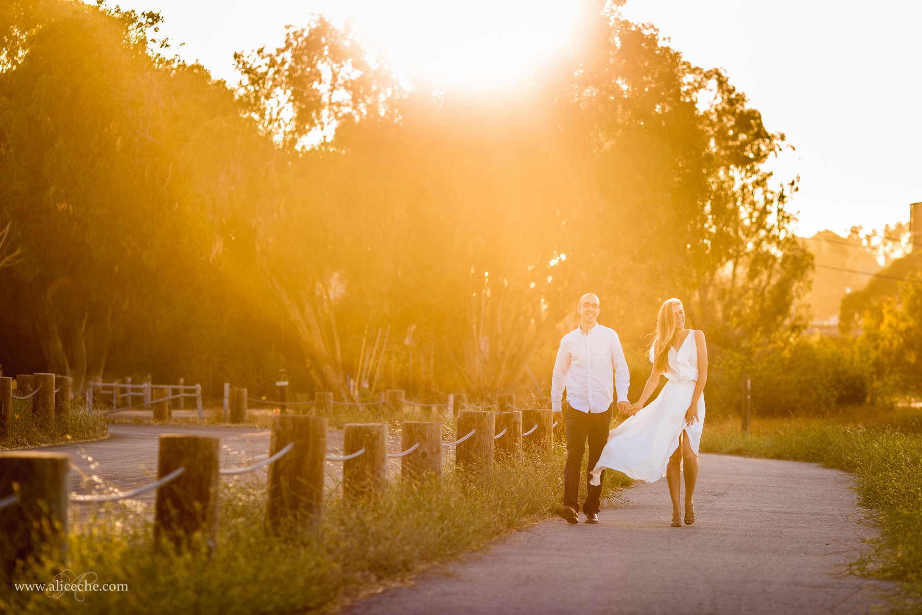 Palo Alto Engagement Photographer Couple Walking on Sidewalk at Sunset