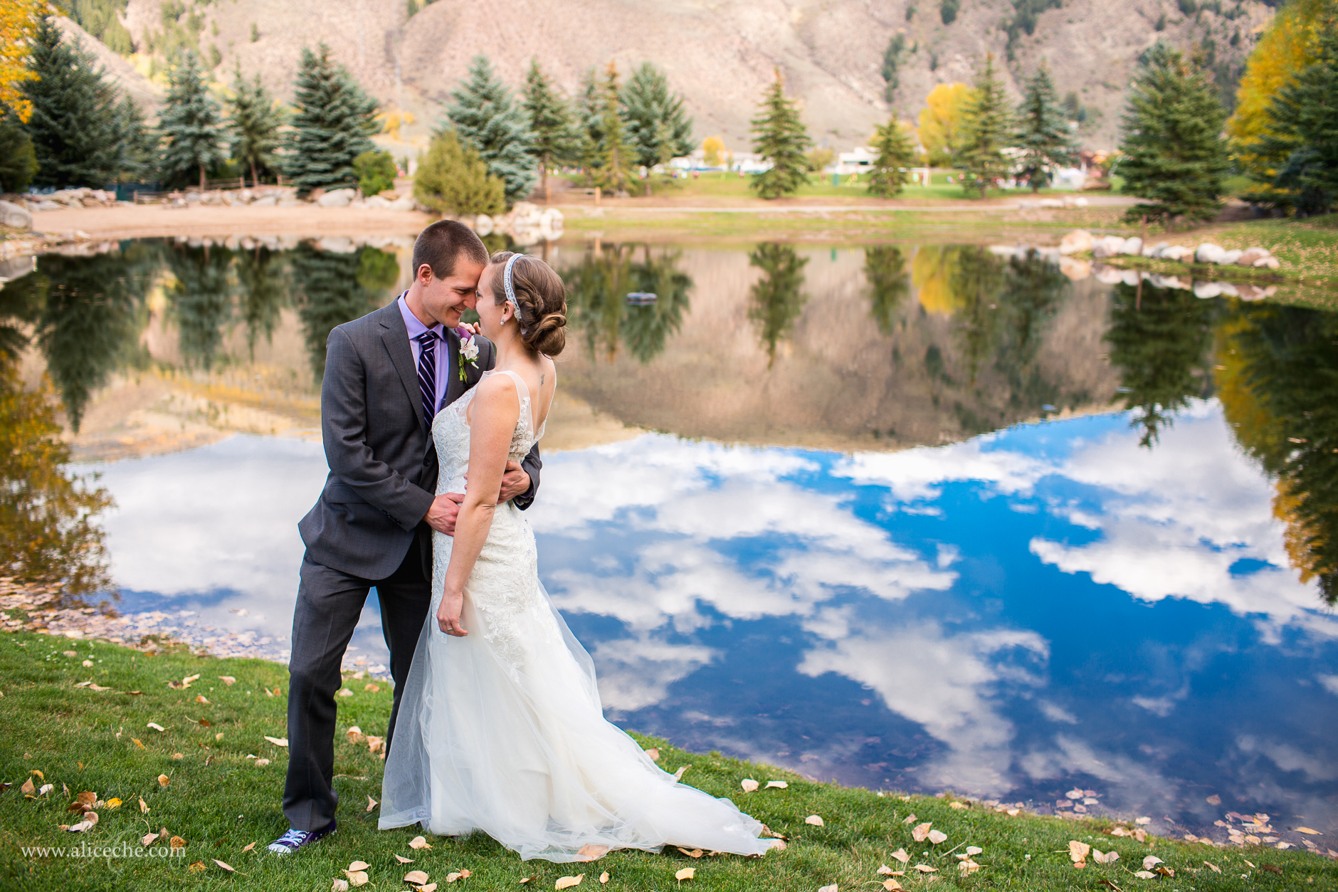 Eagle Vail Pavilion Wedding Destination Photographer Stunning Reflection with Clouds and Gorgeous Couple