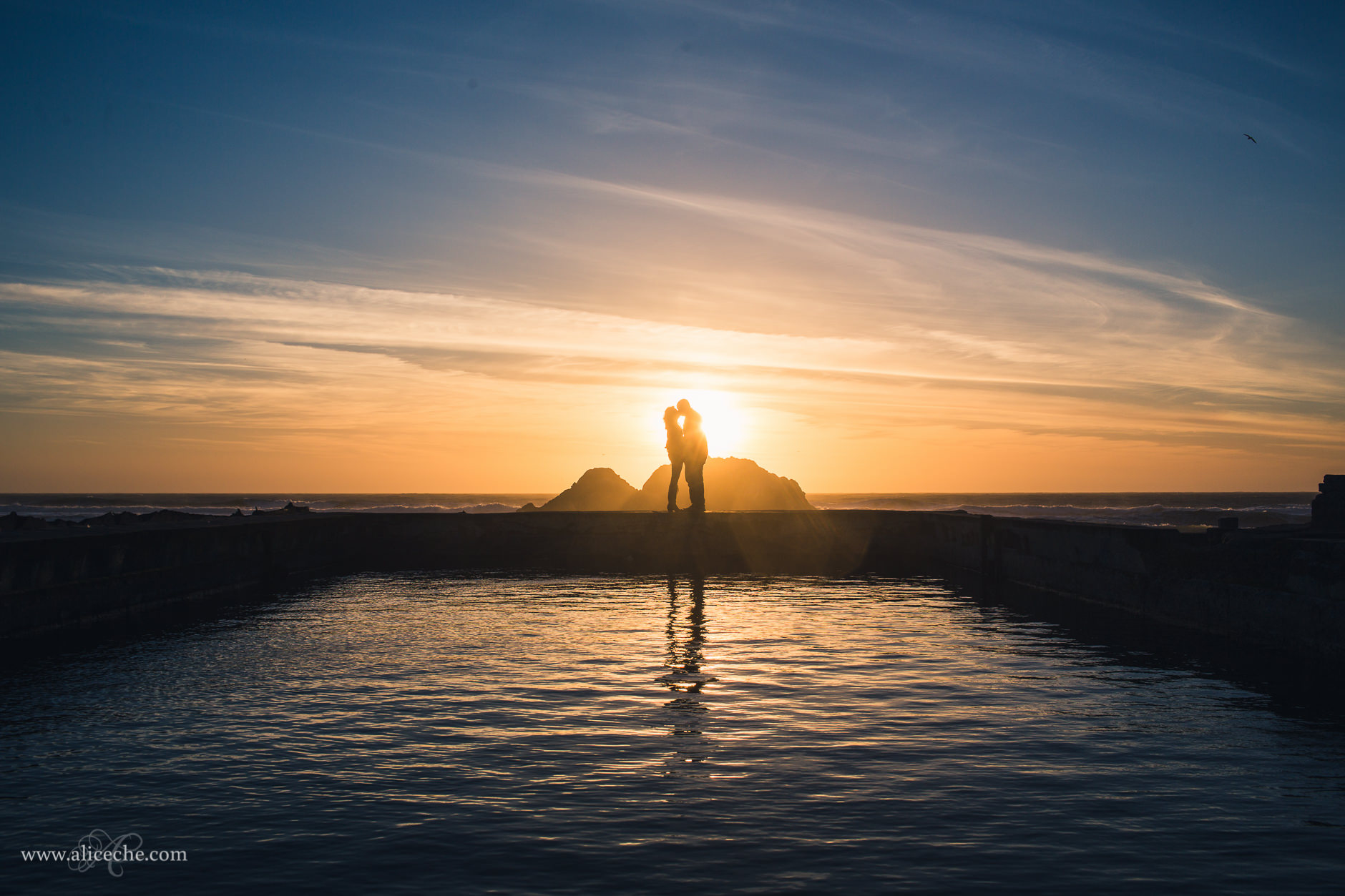 5 Incredible Locations for a San Francisco Engagement Couple Kissing at Sutro Baths