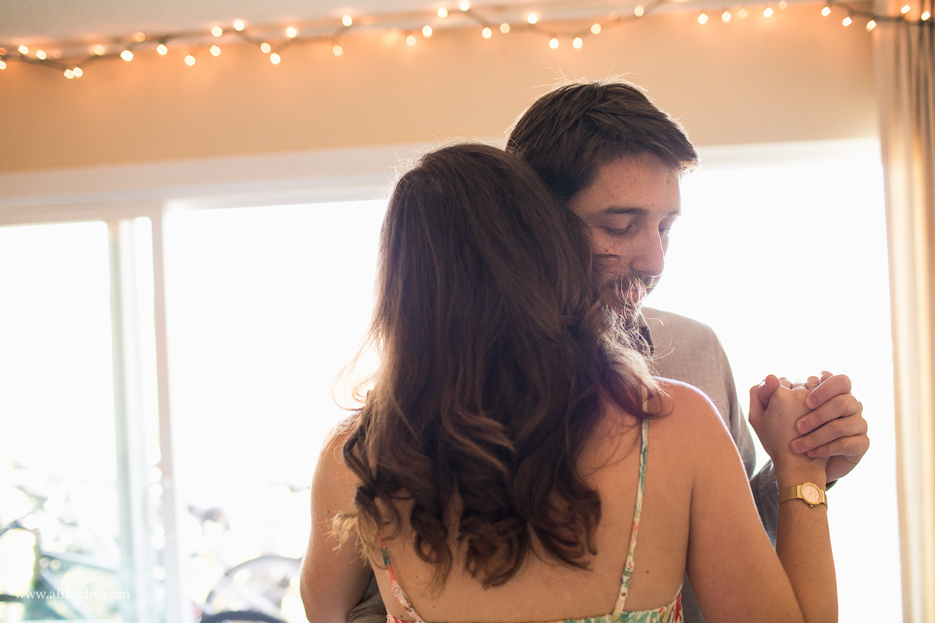 In Home San Carlos Engagement San Francisco Bay Area Photographer Couple Dancing with Fairy Lights