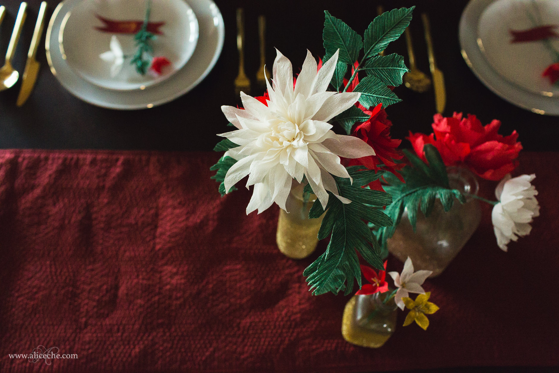 Red and White DIY Paper Flowers on Christmas Table Setting