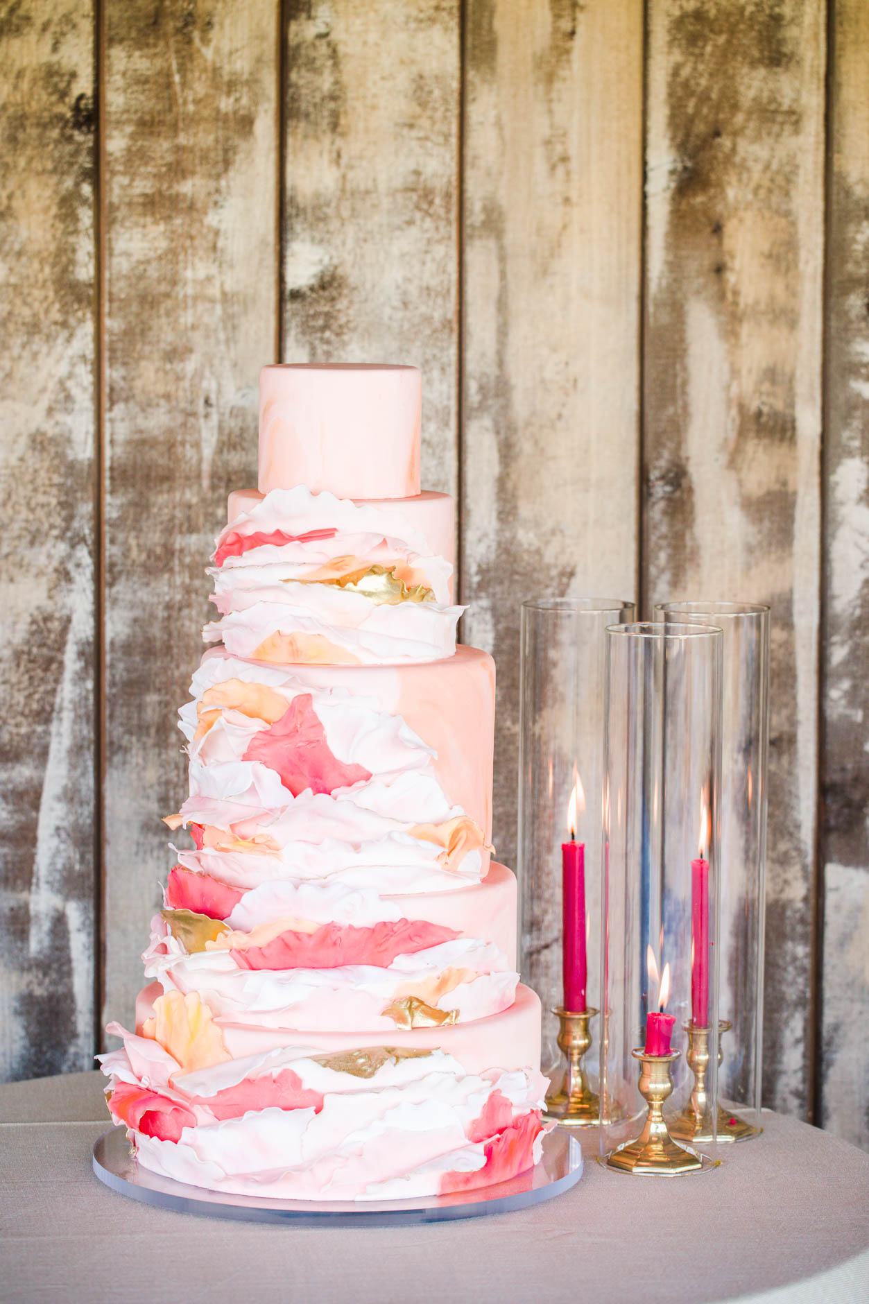 Georgia O'Keefe Inspired Cake with pink, orange and gold ruffles