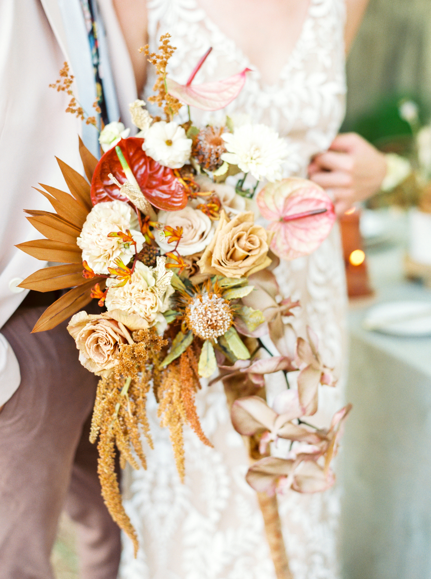 Boho bouquet with dried florals and cascading orchids by Tumbleweed Floral Truck photographed by Alice Che Photography