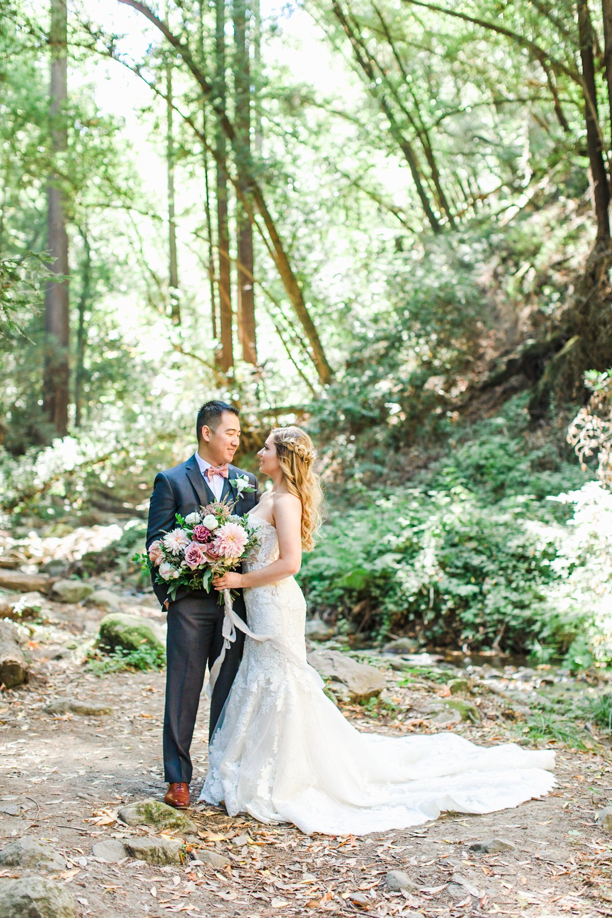 Bride and groom in the redwoods at Cathedral Grove