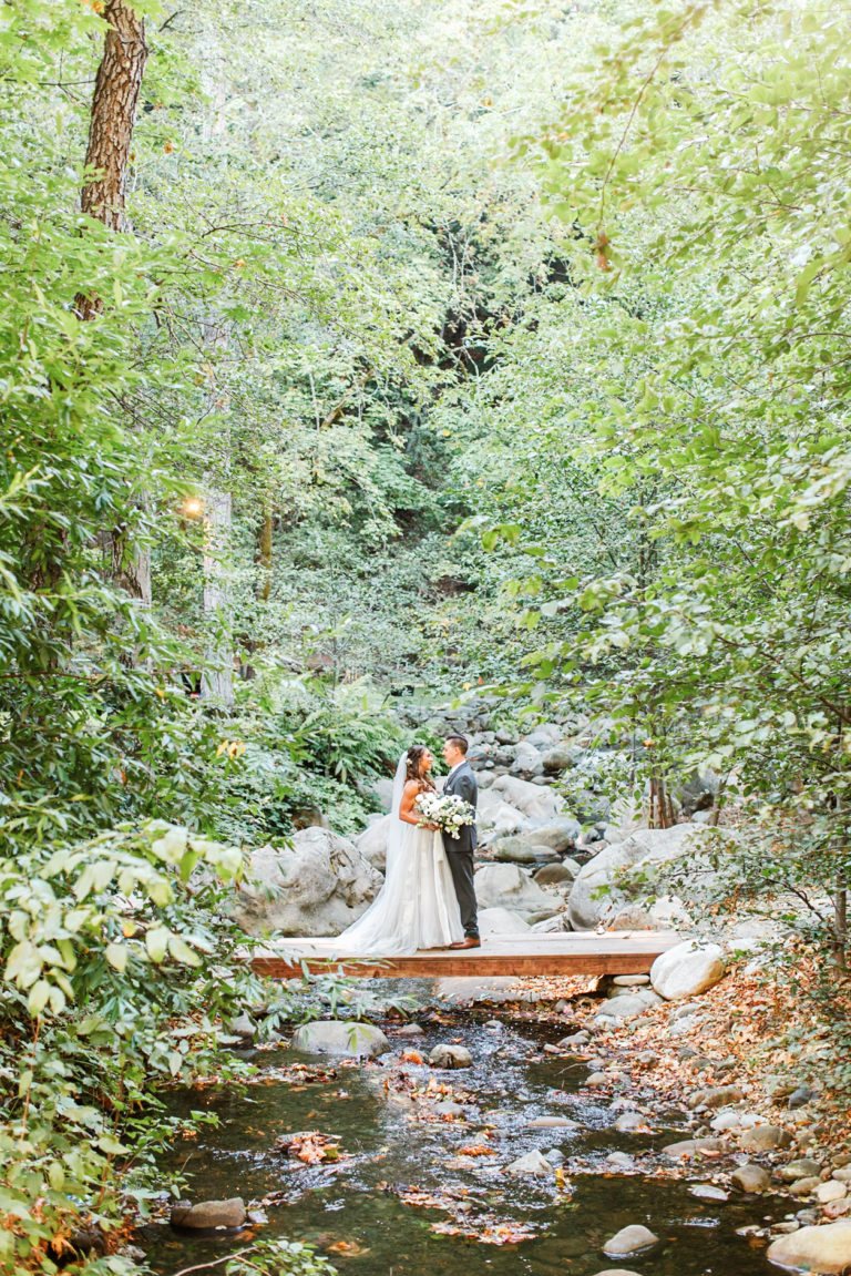 Bobby and Aly's wedding in the redwoods with all white florals